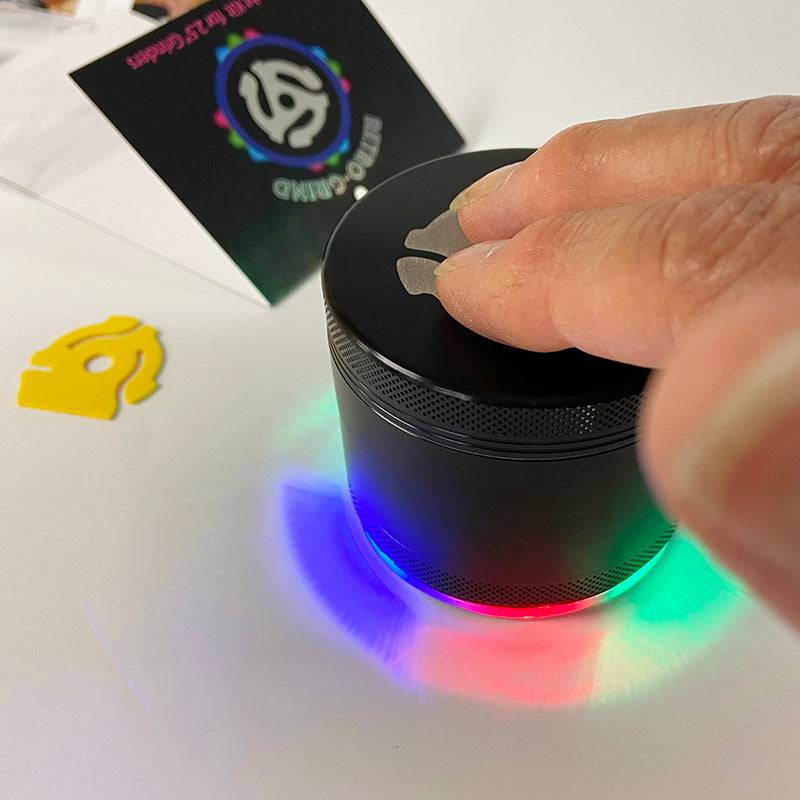 LED Light Show Herb Grinder ~ Magnetic Lid, 4 Pieces with Screen Catcher, Let our fun 2.5" Black Retro-Grind light up your daily grind! - Discreet Smoker