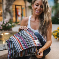 boho messenger bag with woman in park